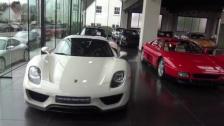 [4k] White Porsche 918 Spyder and Porsche Carrera GT at Belgian dealership